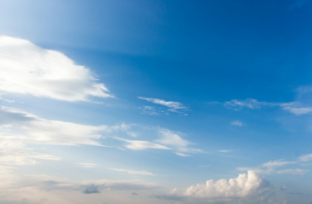 colorful dramatic sky with cloud at sunset.